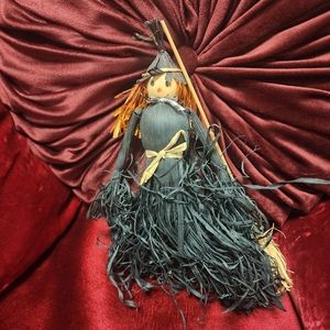 Vintage straw kitchen witch.